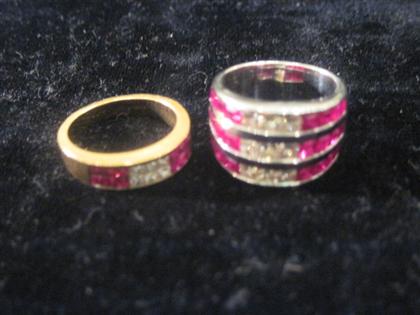 Appraisal: Two ruby and diamond band ringsLarger band of karat white