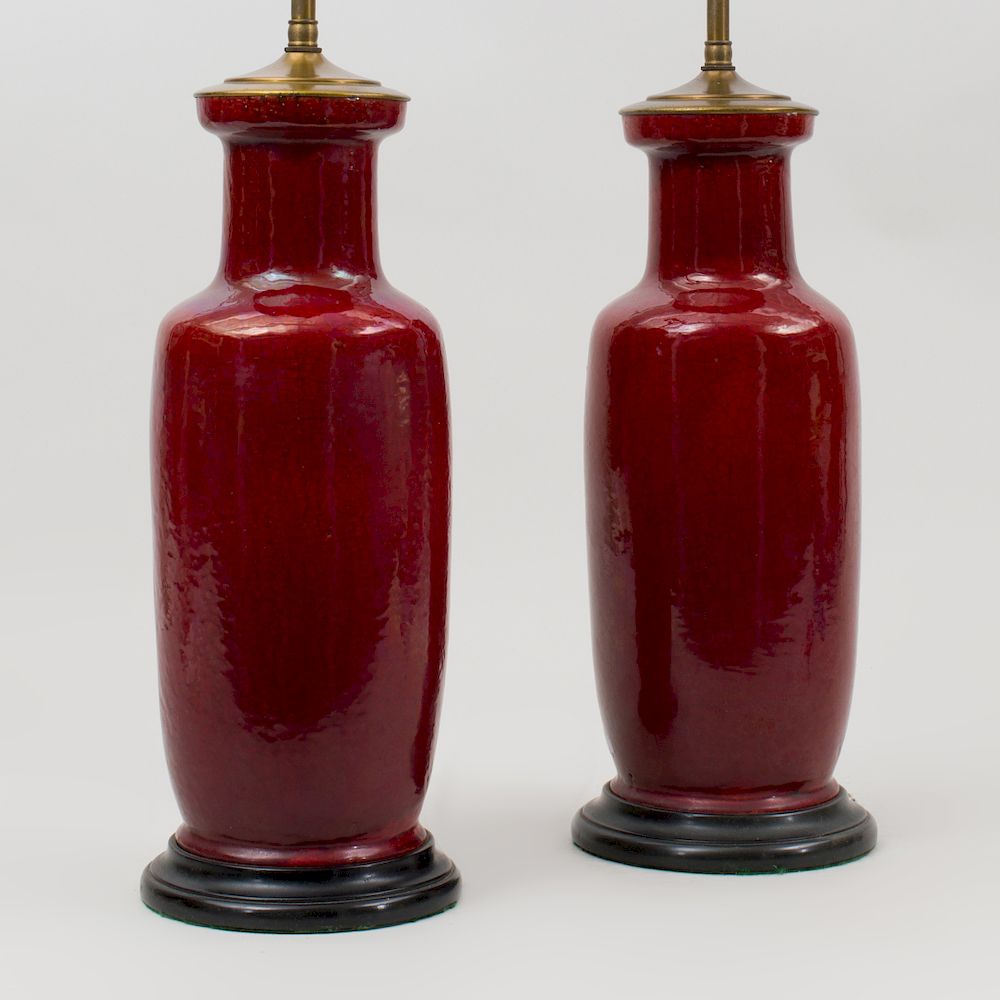 Appraisal: Pair of Chinese Copper Red Porcelain Vases Mounted as Lamps