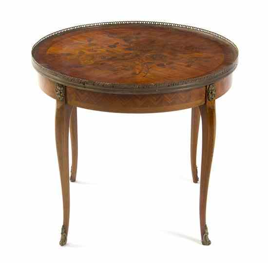 Appraisal: A Continental Marquetry Low Table having a galleried top with