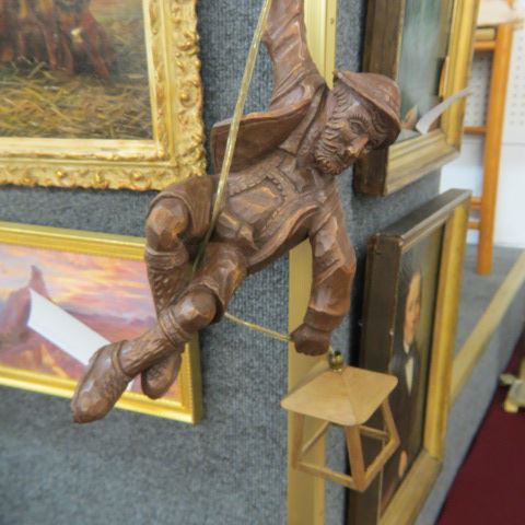 Appraisal: Caved Wooden Figural Mountain ClimbingHanging Lamp German