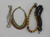 Appraisal: A mixed lot of natural bead jewellery including a pale