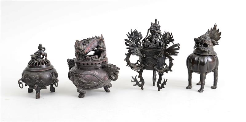 Appraisal: THREE CHINESE ARCHAIC STYLE BRONZE TRIPOD CENSERS AND COVERS AND