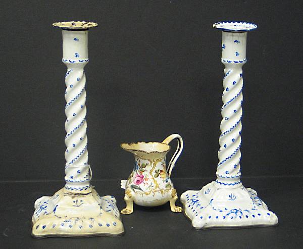 Appraisal: A pair of English enamel on copper candlesticks and cream