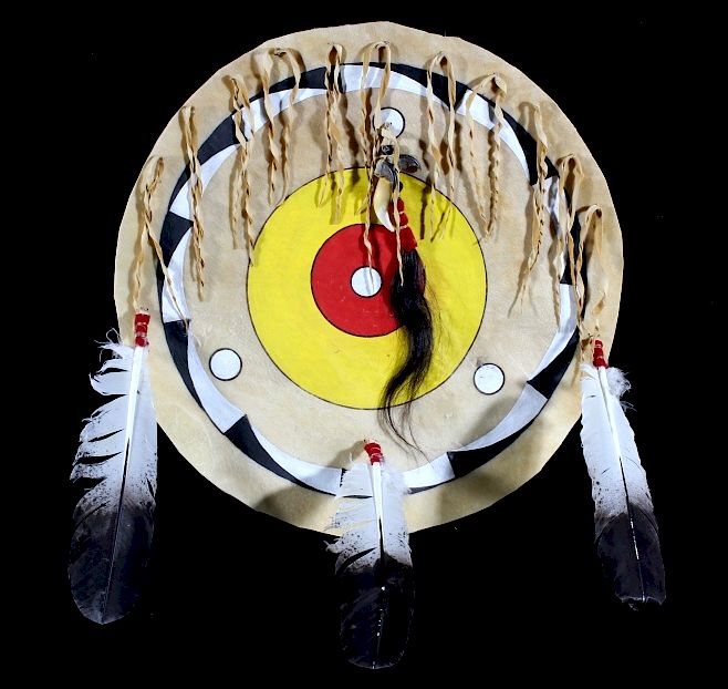 Appraisal: Blackfoot Polychrome Buffalo Rawhide Shield Included in this lot is