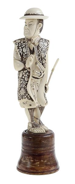 Appraisal: A LARGE JAPANESE CARVED IVORY WARRIOR standing upright holding a