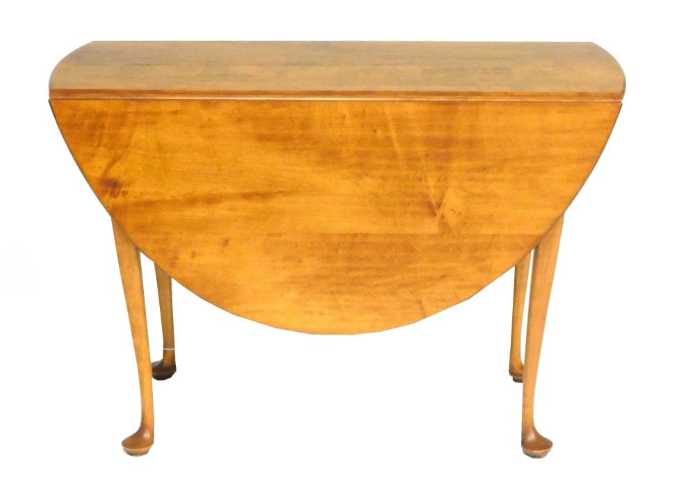 Appraisal: Eldred Wheeler Queen Anne style demilune drop-leaf dining table cherry