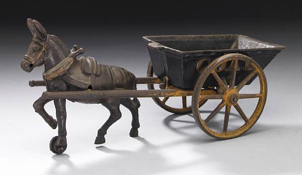 Appraisal: A painted cast iron donkey and coal cart late th