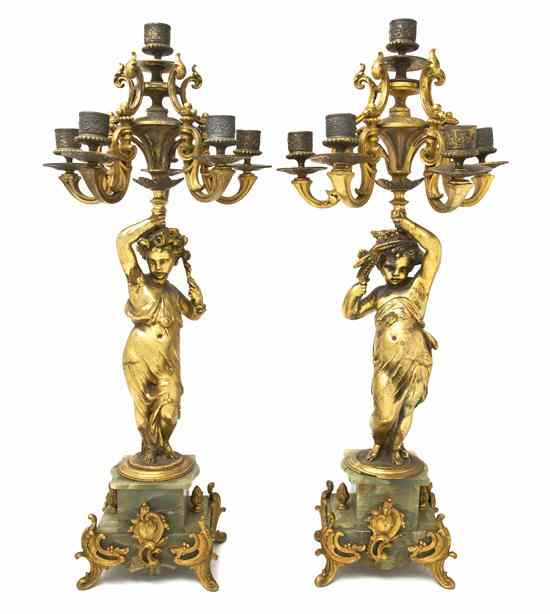 Appraisal: A Pair of Gilt Bronze and Onyx Six-Light Candelabra each