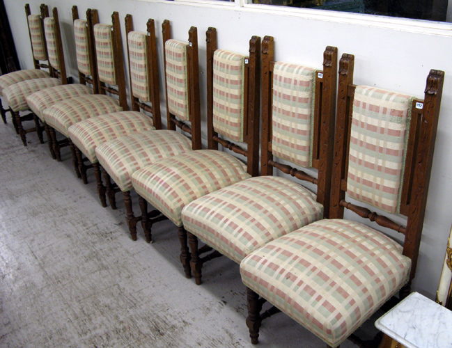 Appraisal: A SET OF TEN UPHOLSTERED OAK DINING CHAIRS Continental late