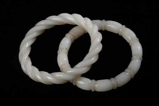 Appraisal: TWO CHINESE WHITE JADE BANGLES - Inside in diam