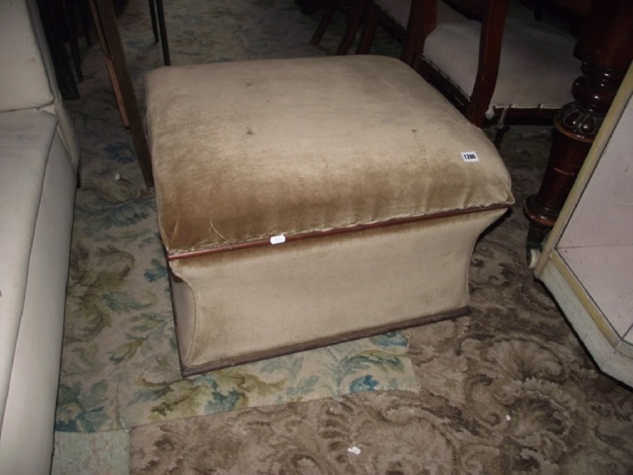 Appraisal: A vintage box ottoman of sarcophagus form with hinged lid