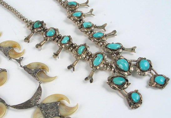 Appraisal: A SOUTHWESTERN NATIVE AMERICAN SQUASH BLOSSOM NECKLACE handmade with silver