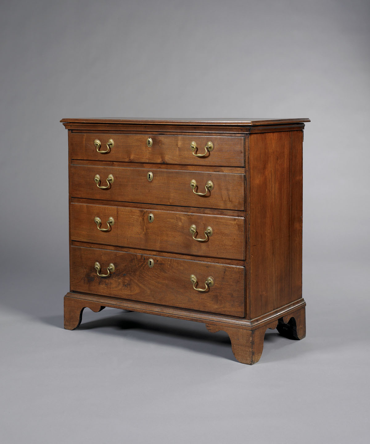 Appraisal: PENNSYLVANIA CHIPPENDALE WALNUT CHEST OF DRAWERS The rectangular top with