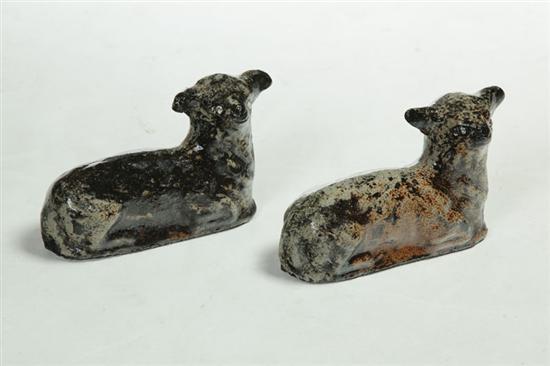 Appraisal: PAIR OF SEWERTILE SHEEP Ohio th century Mottled glaze and