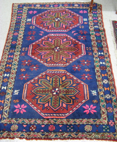 Appraisal: TWO TRIBAL AREA RUGS ' X ' Turkish and a