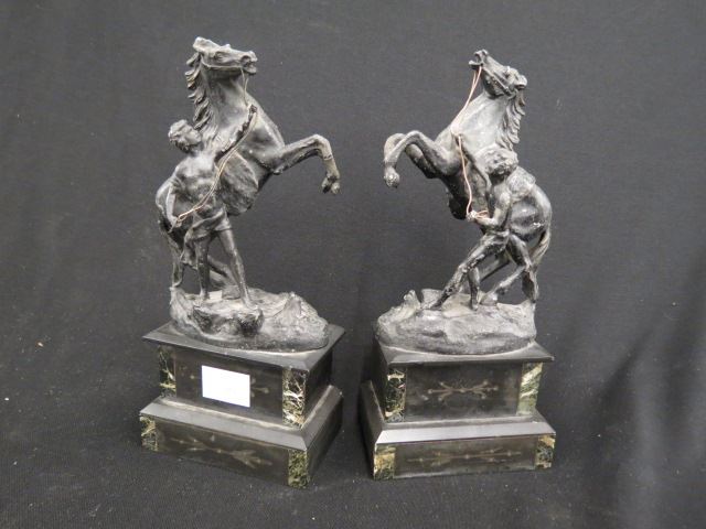 Appraisal: Victorian Spelter Figurines of Man Horses rearing horses tall