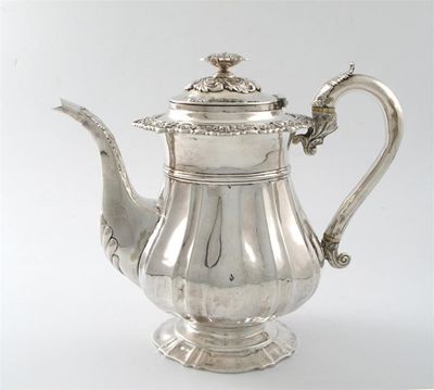 Appraisal: A George IV coffee pot with a shaped baluster body