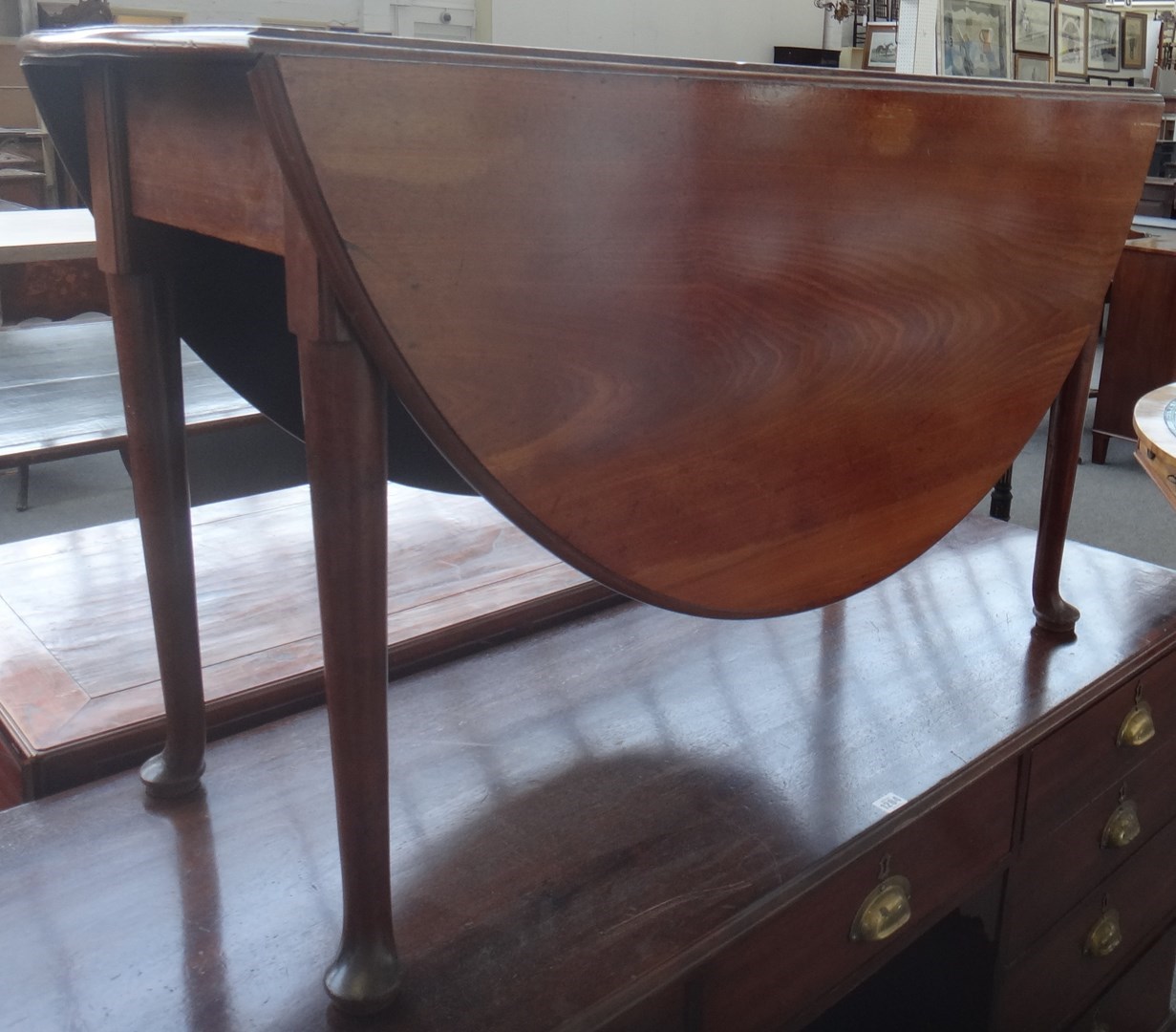 Appraisal: A mid th century mahogany drop flap table cm wide