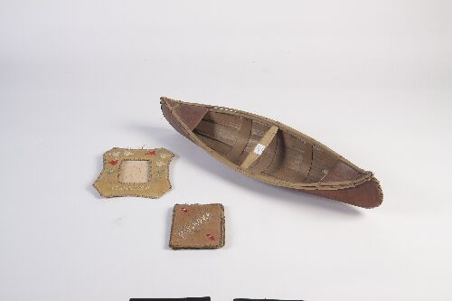 Appraisal: A North American miniature birch bark canoe cm long a