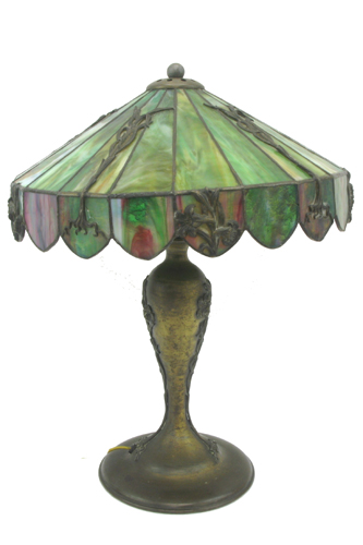 Appraisal: AN AMERICAN TABLE LAMP The patinated metal pedestal base with