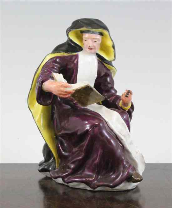 Appraisal: A Bow seated figure of a nun c reading the