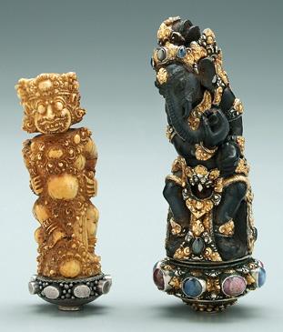 Appraisal: Two ornate Kris handles one carved ivory with figure silver