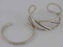 Appraisal: Silver A Tiffany bangle and a geometrically decorated bangle