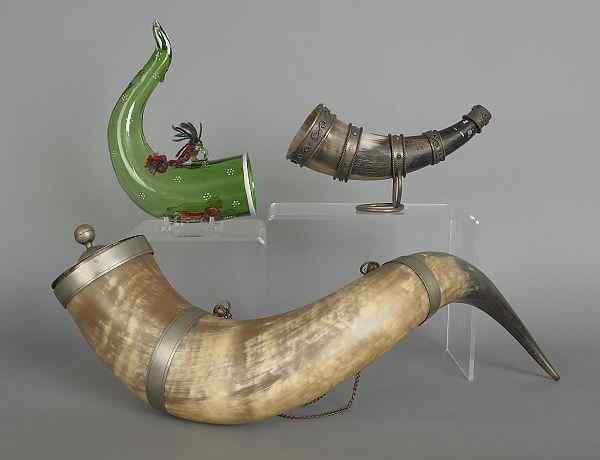 Appraisal: Enamel decorated glass horn together with two other powder horns