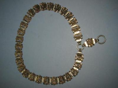 Appraisal: A VICTORIAN SILVER COLLAR the fancy pierced and beaded links