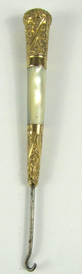 Appraisal: A late Victorian button hook the tapered handle with mother