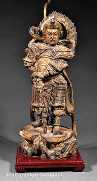 Appraisal: A Chinese Carved and Gilded Wood Figure of Guandi the