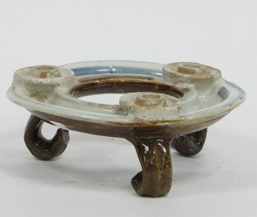 Appraisal: Seth Cardew Wenford Bridge Pottery ARR A three-light candle holder