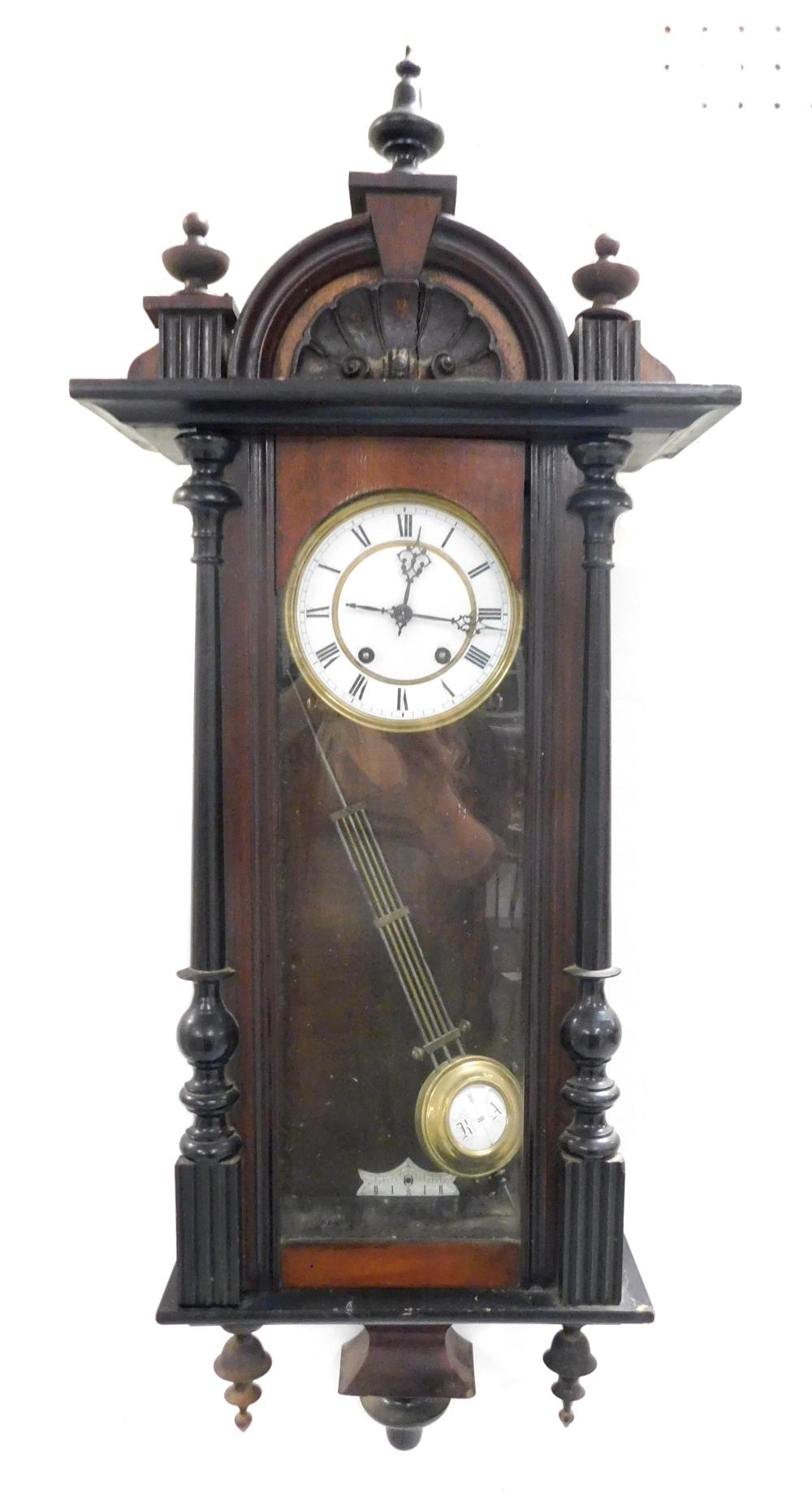 Appraisal: Victorian wall clock wooden case glass front door maker's mark