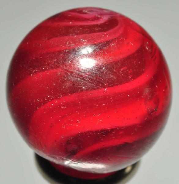 Appraisal: Rare Red Glass Swirl Marble Description Red base glass with