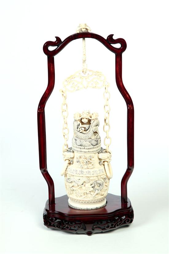 Appraisal: IVORY HANGING URN WITH STAND Asian early th century Dragon