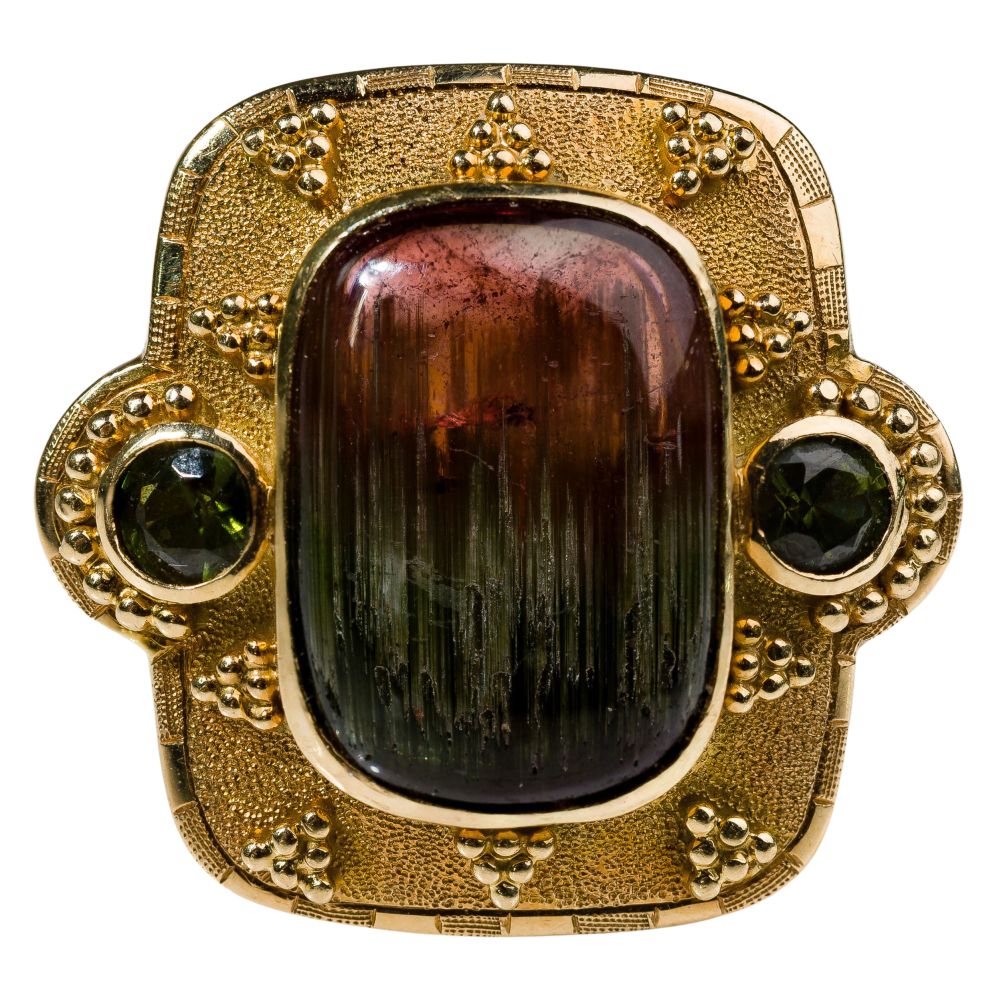 Appraisal: K YELLOW GOLD AND GEMSTONE RINGArchitectural statement style having a