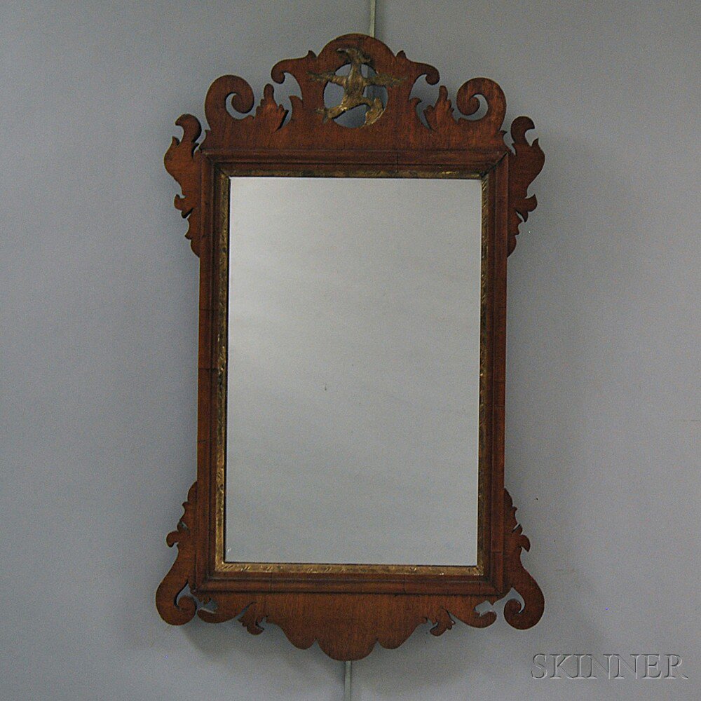 Appraisal: Chippendale Carved Mahogany Scroll-frame Mirror th century the cresting with