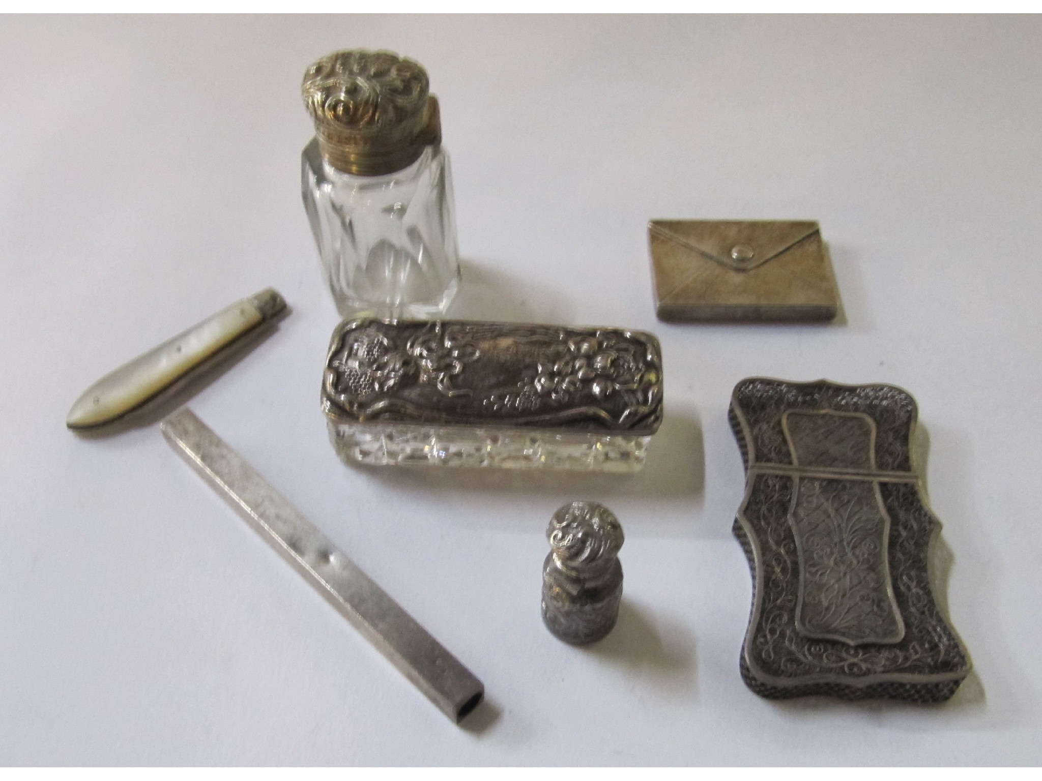 Appraisal: A lot comprising silver topped jar bottle filigree card case