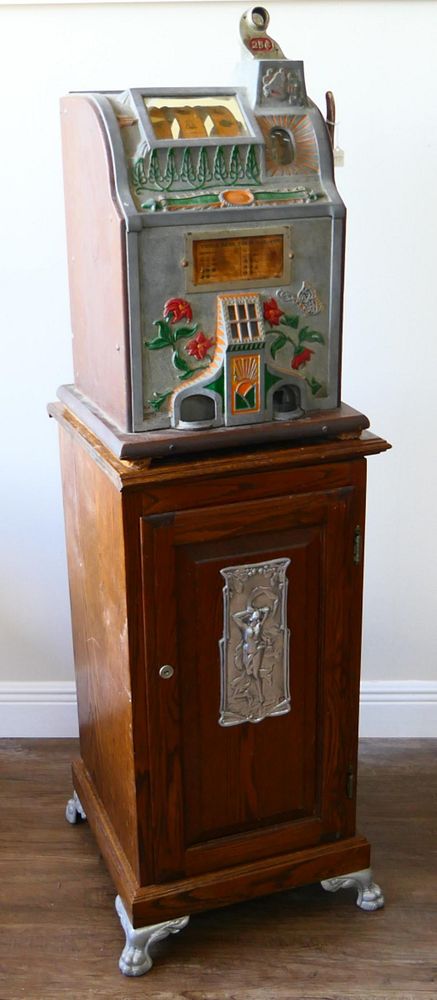 Appraisal: MILLS CENT SLOT MACHINE ON WOODEN CABINET Mills Novelty Company