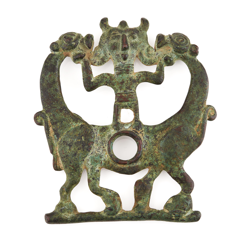 Appraisal: ARCHAISTIC BRONZE PENDANT cast in openwork depicting a horned deity