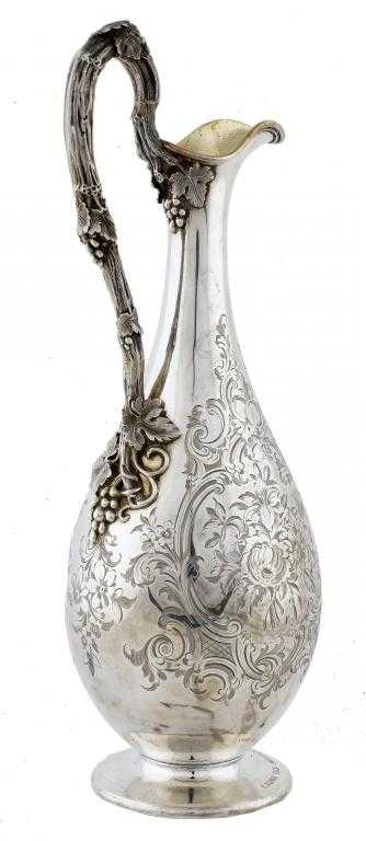 Appraisal: A VICTORIAN CLARET JUG of baluster shape with fruiting vine