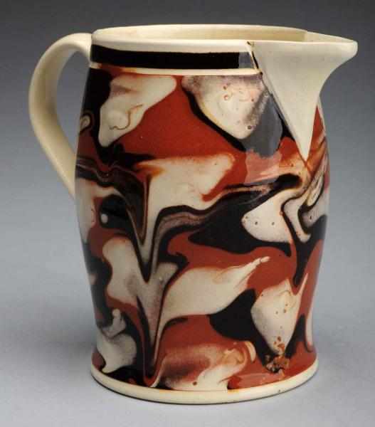 Appraisal: Early th Century Mochaware Swirled Creamer One tight hairline near