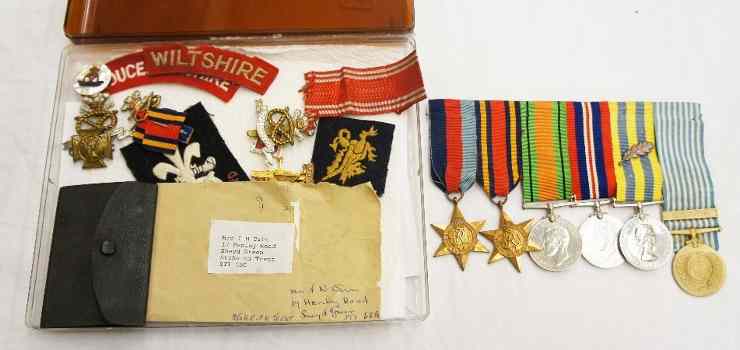 Appraisal: A Group of Six Medals and Artefacts from P T