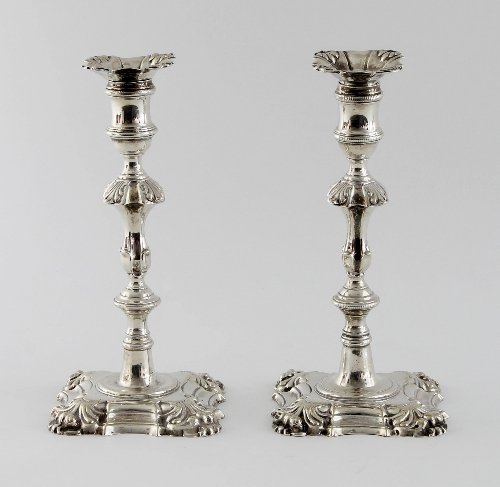 Appraisal: A matched pair of George III silver candlesticks one Ebenezer