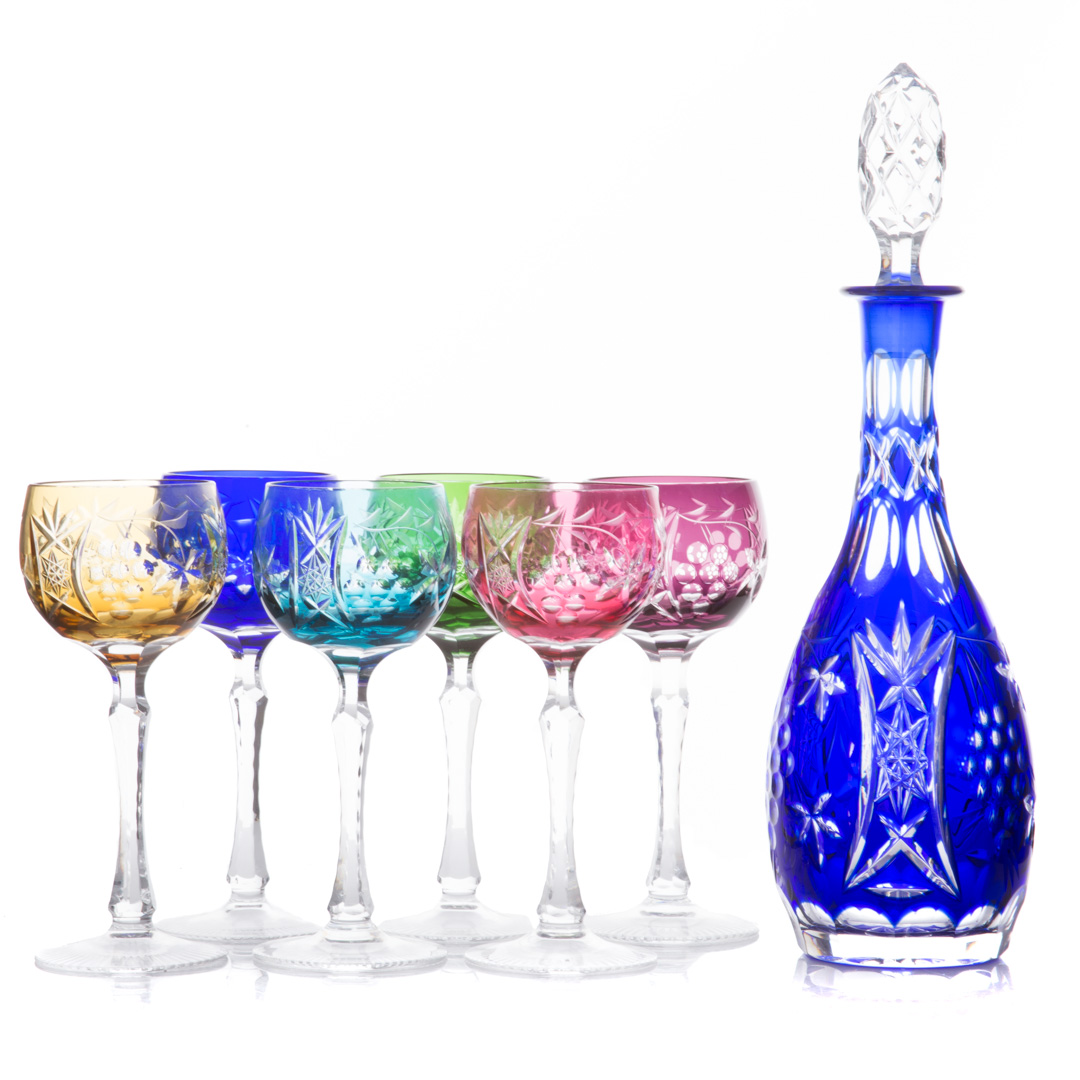 Appraisal: crystal wine goblets and a decanter In various colors cut-to-clear