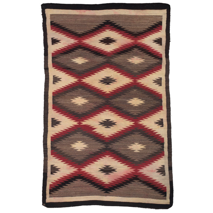 Appraisal: Navajo rug c serrated diamond pattern in red brown and