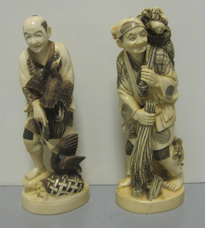 Appraisal: TWO CARVED IVORY JAPANESE FIGURES Worker with birds and farmer