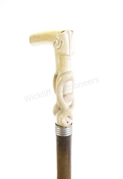 Appraisal: Hand Carved Physicians Cane segmented shaft holds various physicians instruments