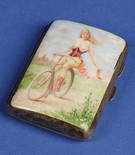 Appraisal: A VICTORIAN ENAMELLED CIGARETTE CASE depicting a maiden riding on