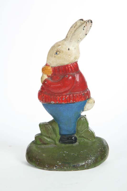 Appraisal: DOORSTOP Probably Hubley A rabbit eating a carrot with red